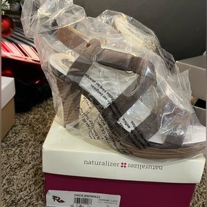 Brown open toe heels.